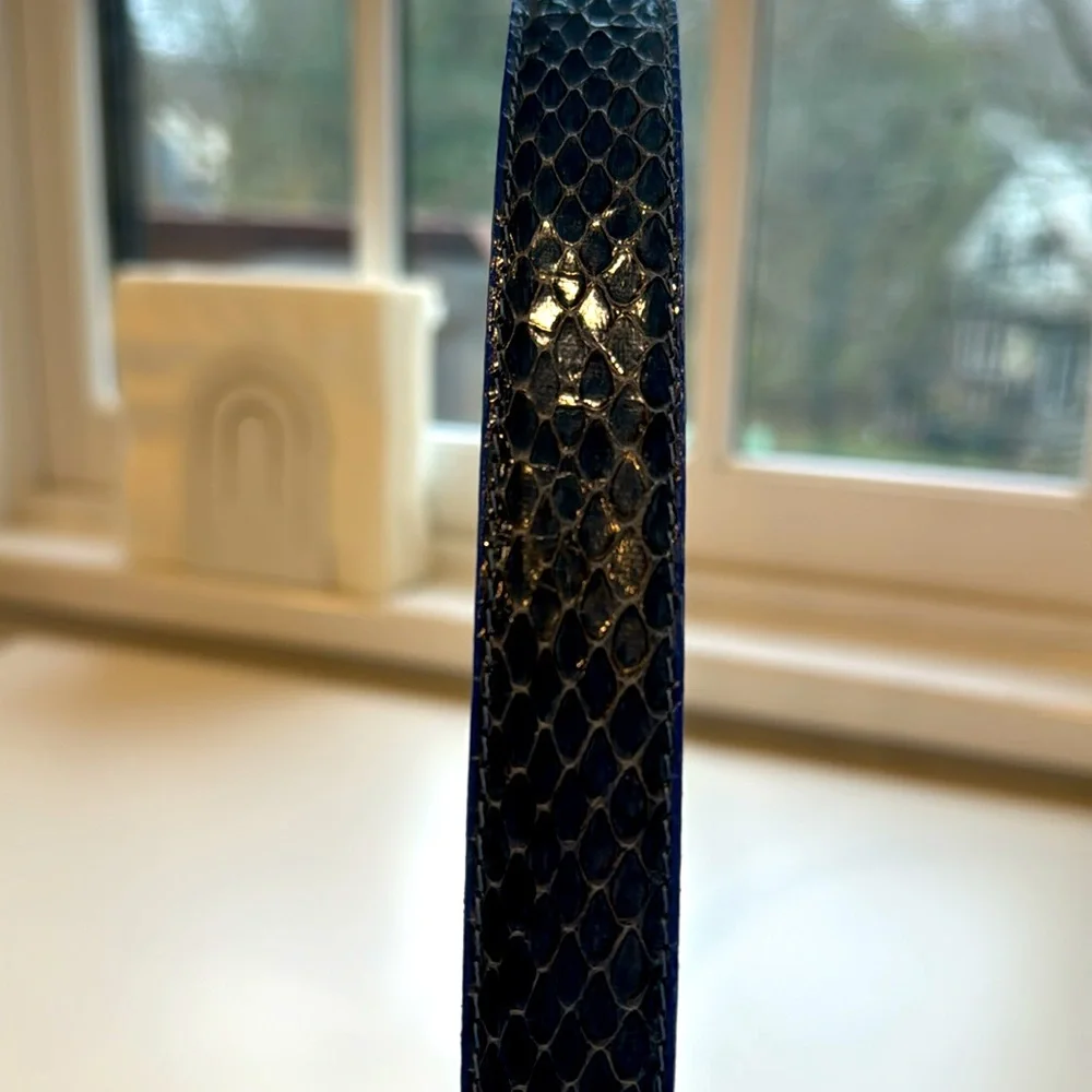 Women’s Snake Skin and leather belt. Navy. 49 inches. EUC.